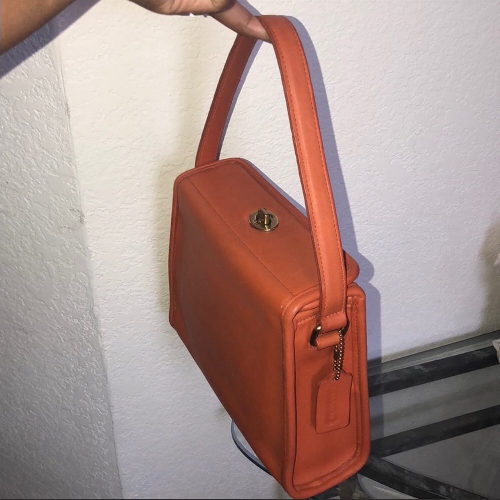 Doris Day Coach turn lock flap evening purse.